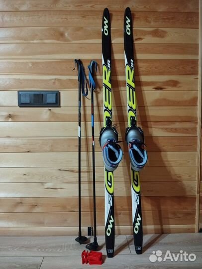 Детские лыжи 130,палки 100,ботинки 31