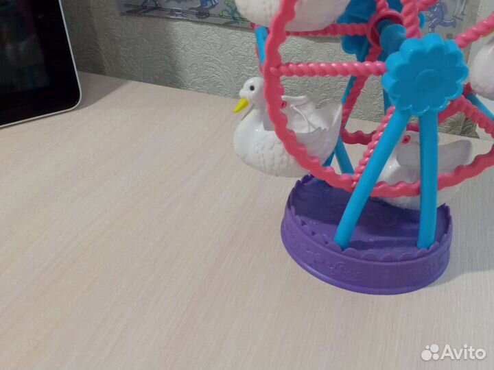 Игрушка качель