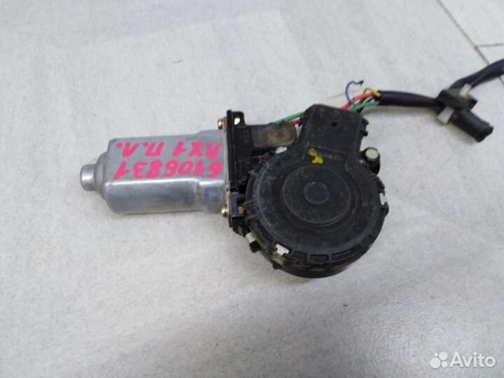 Моторчик переднего левого стеклоподъемника 8572048
