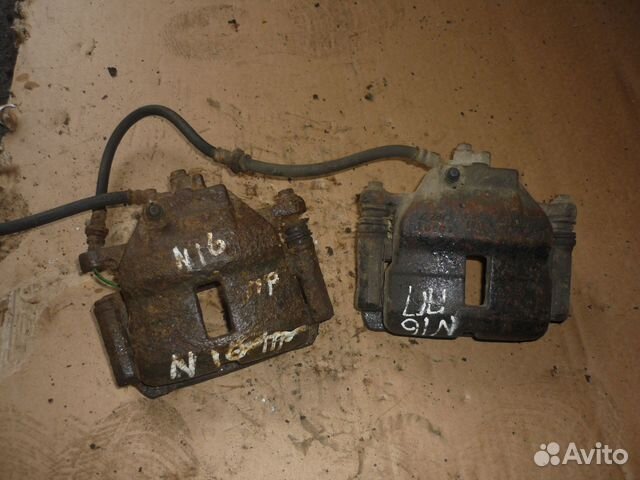 Суппорт передний правый Nissan almera n16