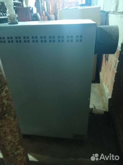 Твердотопливный отопительный котел напольный бу