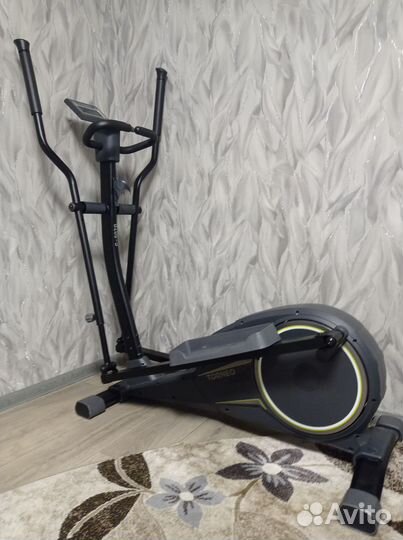 Эллиптический тренажер torneo