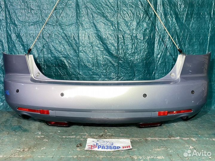 Бампер задний Mazda CX-7 I (2006—2009)