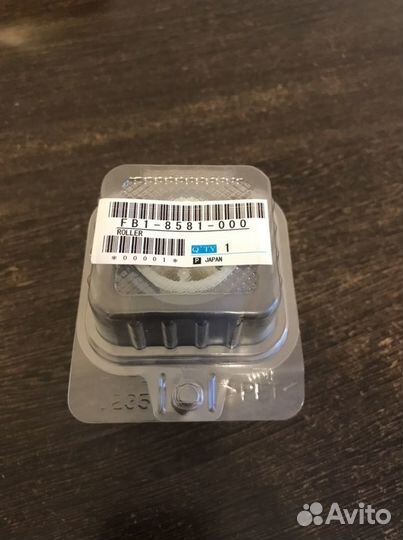 FB1-8581-000 Ролик захвата бумаги из обходного лот