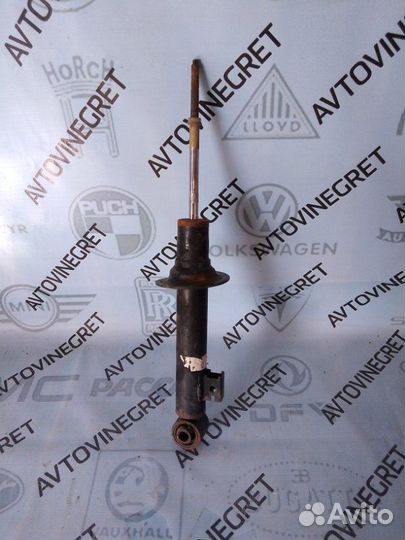 Стойка амортизатор передняя Mitsubishi L200