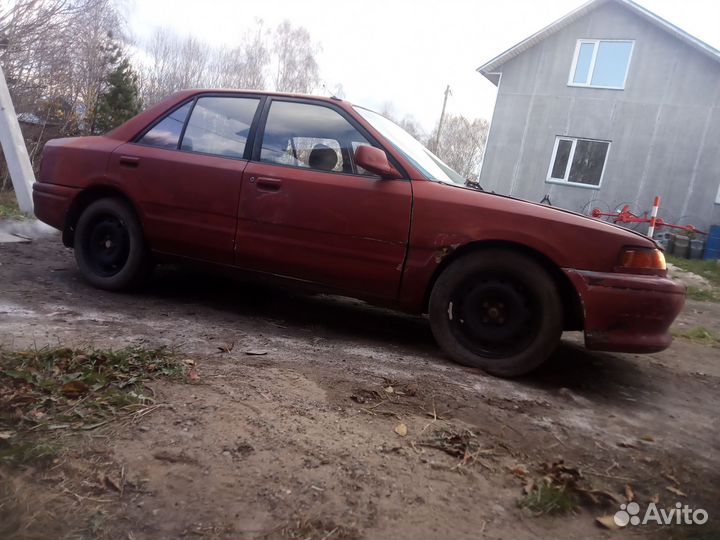 Mazda Familia 1.5 AT, 1991, 175 000 км