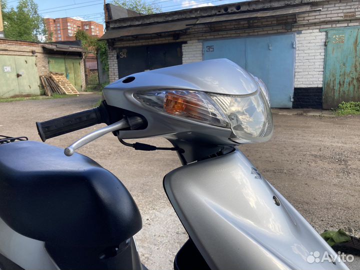 Скутер Сузуки адрес V50