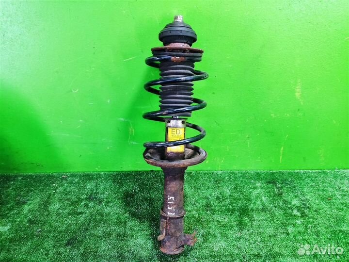 Стойка амортизатора передняя правая Chevrolet Spa
