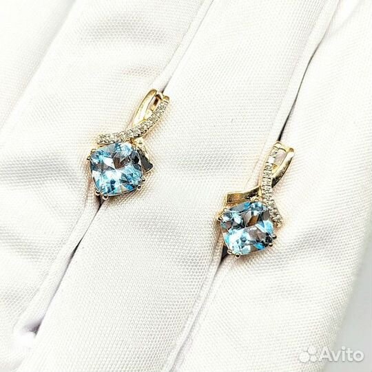 Золотые серьги с камнем