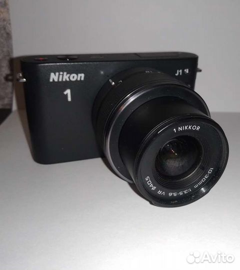 Комплект Nikon 1 J1 + 10-30 мм VR, черный