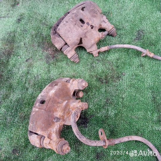 Суппорт тормозной Toyota Corsa