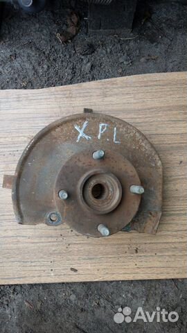 Mitsubishi Lancer 9 Поворотный кулак передний лев