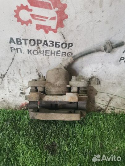 Суппорт тормозной передний правый Лада Приора
