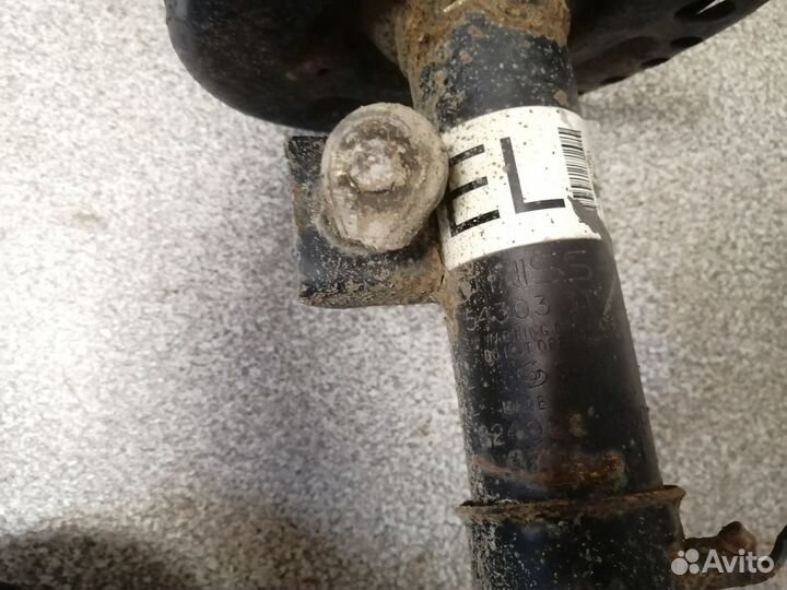 Амортизатор передний левый для Nissan Teana L33