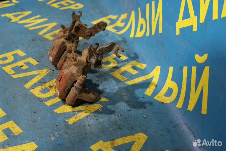 Суппорт задний Nissan Maxima a32