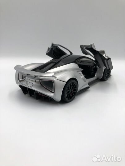 Модель автомобиля Lotus Evija металл 1:24