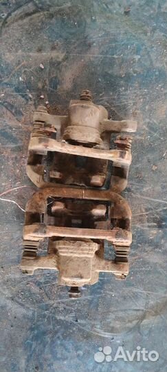 Суппорт тормозной задний Chevrolet Lacetti