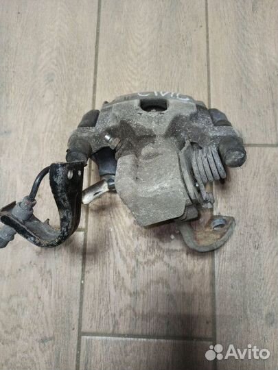 Суппорт тормозной задний правый Honda Civic