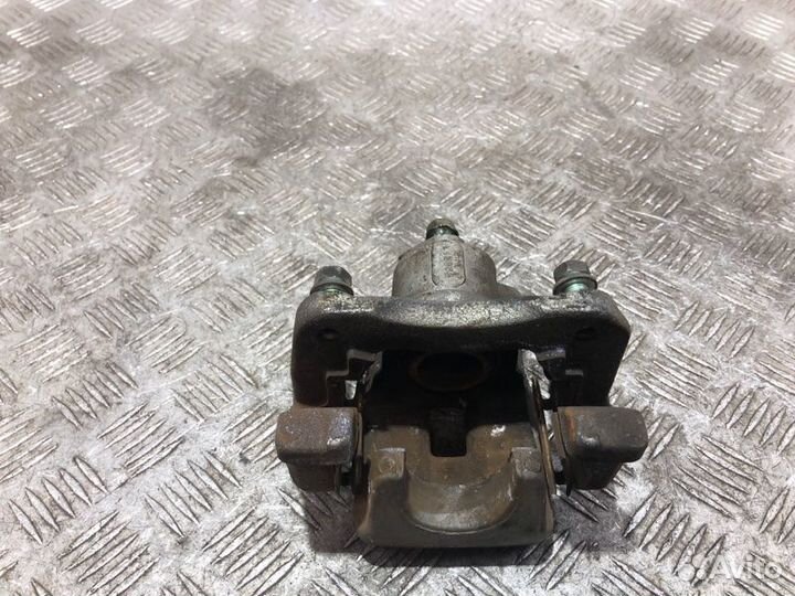 Суппорт тормозной задний левый Toyota Camry V40