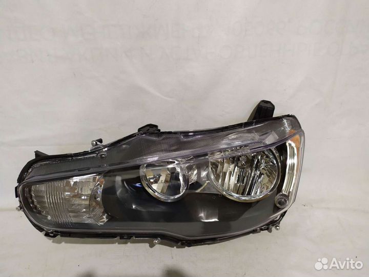 Фара левая Lancer X