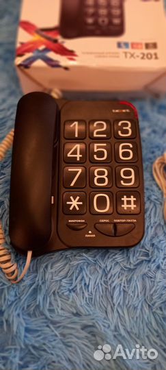 Телефон teXet