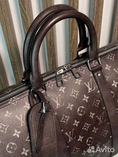 Кожаная сумка Louis Vuitton