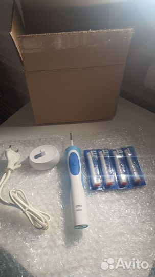 Новая электрическая зубная щетка Braun Oral-B