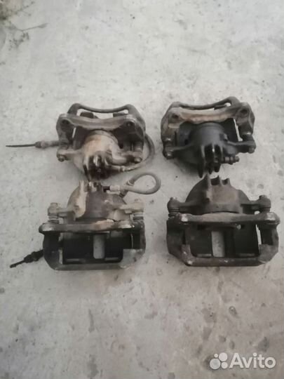 Тормозной суппорт 1.8GDI Митсубиси Каризма