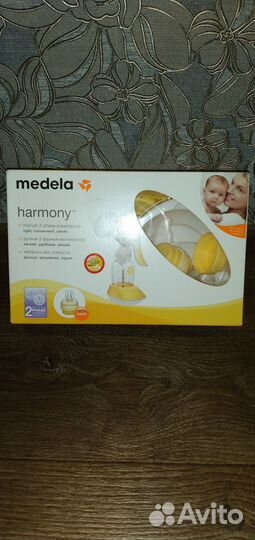 Молокоотсос medela ручной