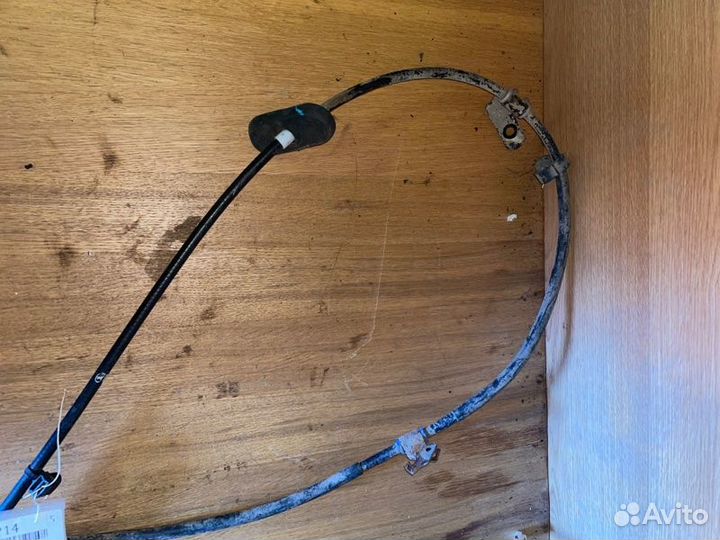 Трос ручного тормоза левый Opel Astra J A16XER