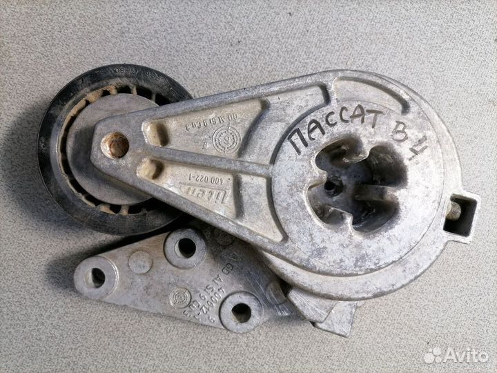Натяжитель ремня Volkswagen Passat B4