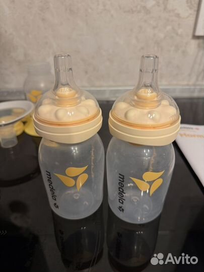 Молокоотсос medela ручной соски calma