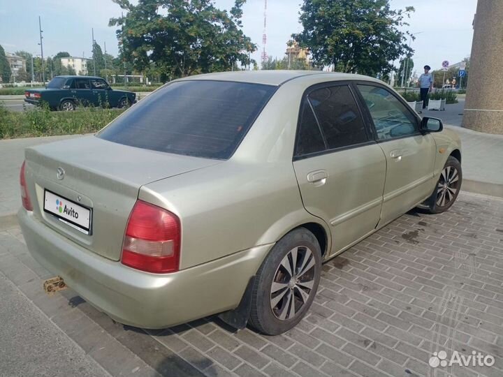 Mazda 323 1.6 МТ, 2002, 366 503 км
