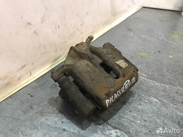 Суппорт тормозной передний левый Citroen Xsara