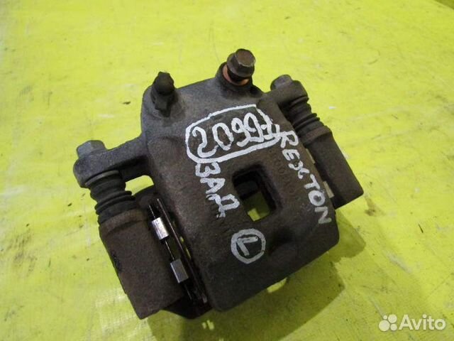 Суппорт тормозной SsangYong Rexton 01-06г 20991