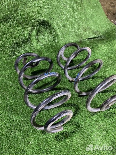 Пружина Nissan note e11 задняя