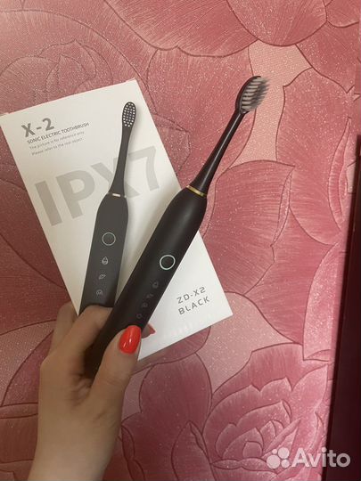 Электронная зубная щетка