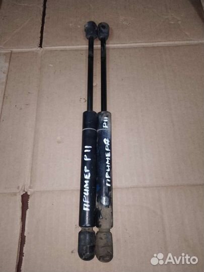 Амортизатор крышки багажника Nissan Primera p11