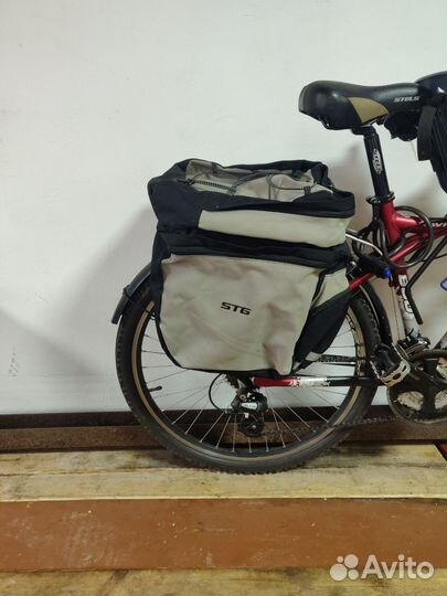 Дорожная сумка и детское кресло на велосипед