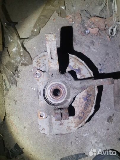 Кулак поворотный передний правый Mitsubishi Lancer