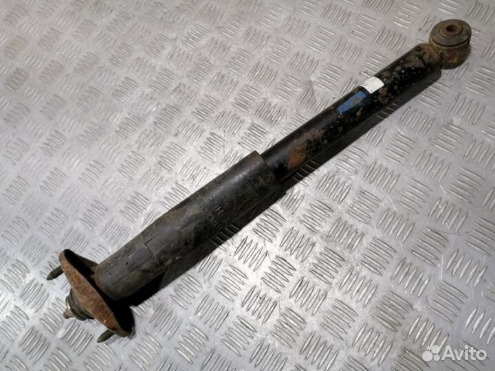 Амортизатор задний левый Mazda Cx7 2007-2012