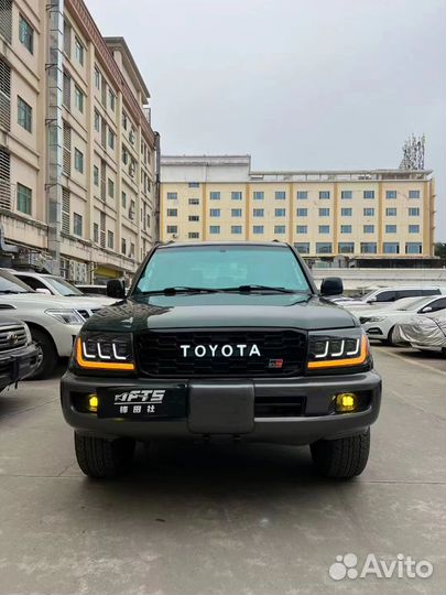 Фары с решеткой Toyota Land Cruiser 100