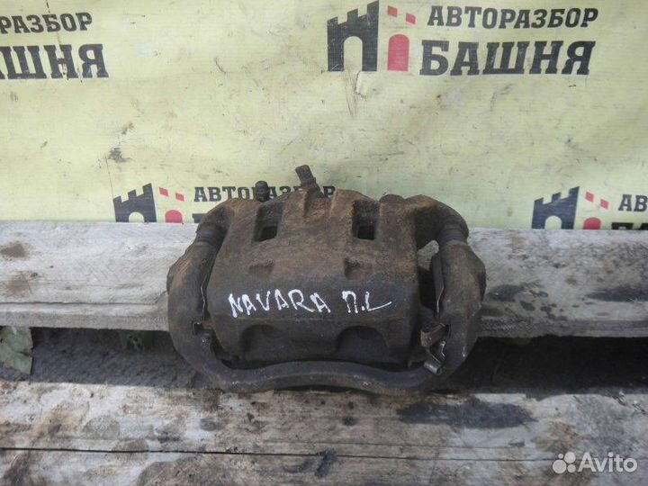 Суппорт тормозной передний левый Nissan Navara