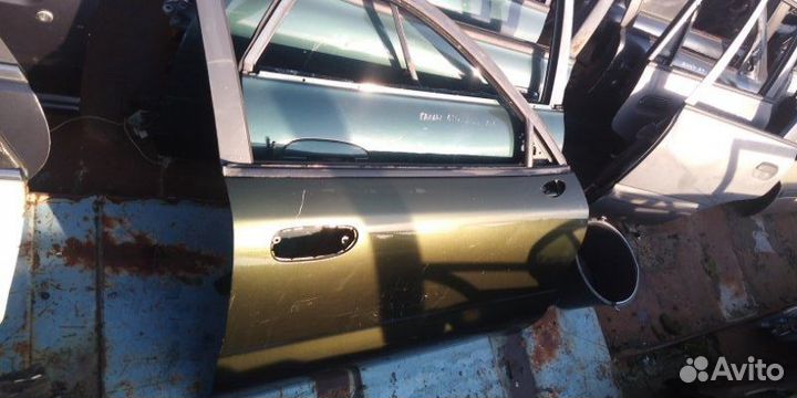 Дверь Mitsubishi Carisma