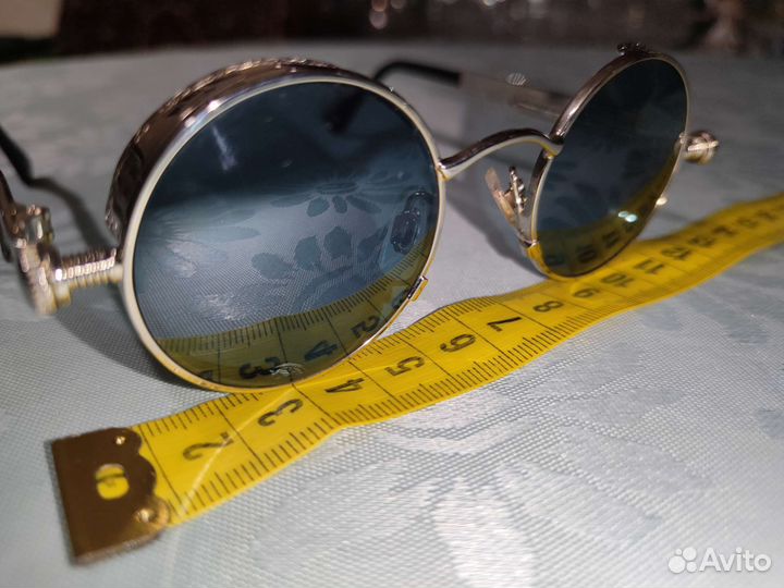 Солнечные очки круглые