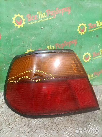 Фонарь задний левый Nissan Almera N 15 1.4 GAL 4
