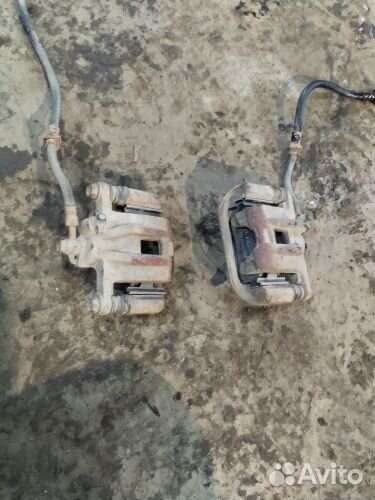 Суппорт задний Шевролет Лачетти