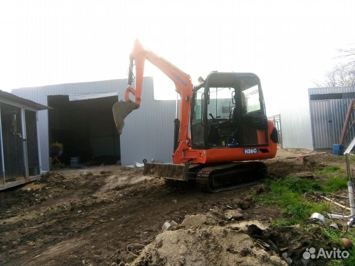 Услуги миниэкскаватора