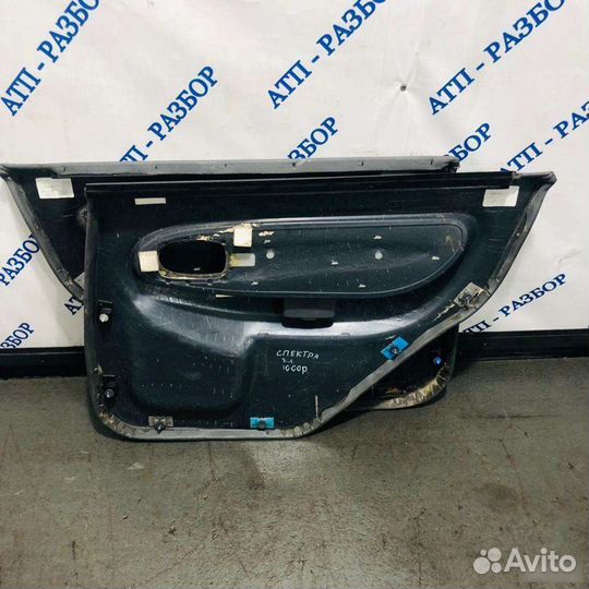 Обшивка двери задняя левая Kia Spectra 2001-2004