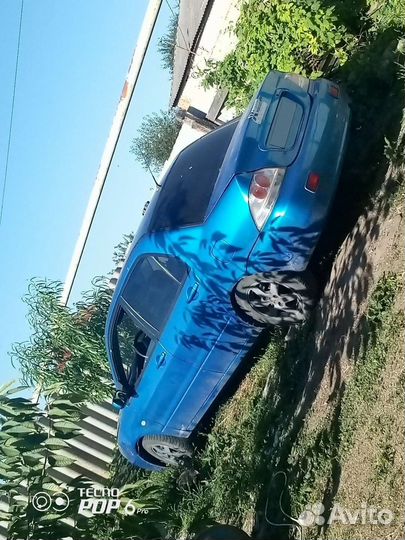 Mitsubishi Lancer 1.6 МТ, 2003, 10 000 км